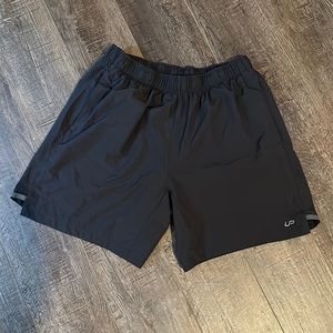 Men’s athletic shorts, with liner. Size large. Black.